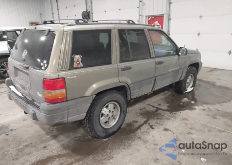 1997 Jeep Grand Cherokee Laredo/Tsi из США, поврежденный, VIN 1J4GZ58S3VC777456